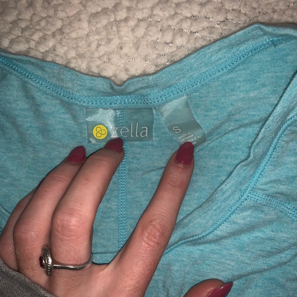Light blue Woman’s athletic short sleeve shirt